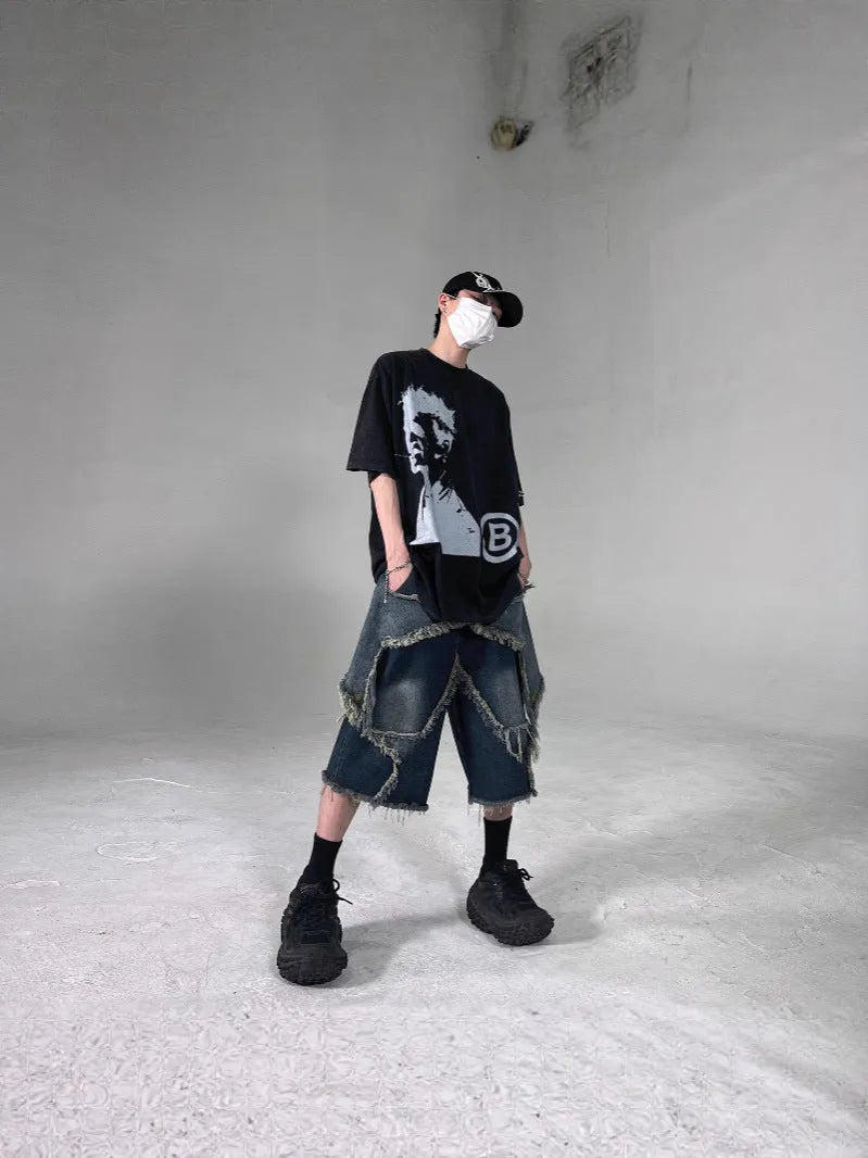 Blue men's denim shorts with frayed hem and five-pointed star decoration in loose retro style