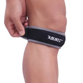 Black and grey elastic patella retinaculum knee support pad for sports.