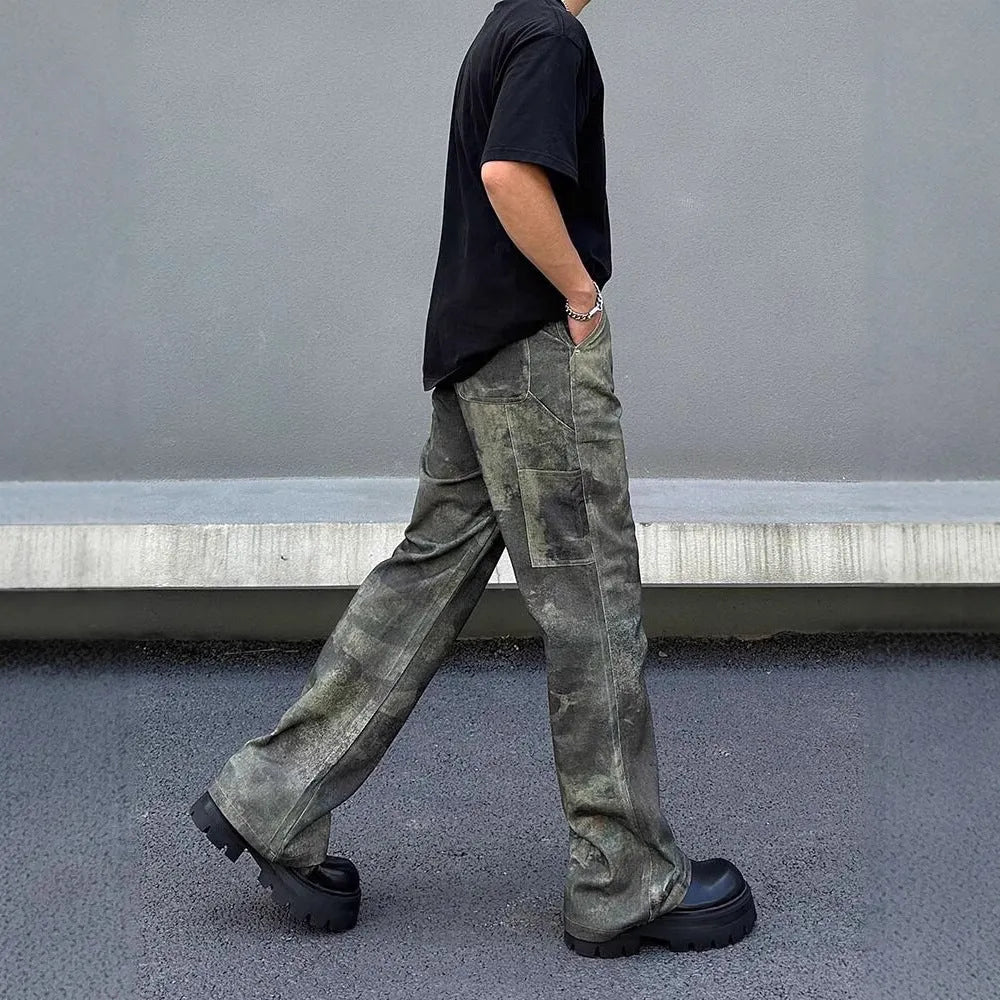 Man wearing retro digital camouflage print straight-leg jeans in cotton denim.