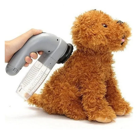 Grey portable pet hair remover vacuum cleaner with soft rubber head for grooming dogs and cats