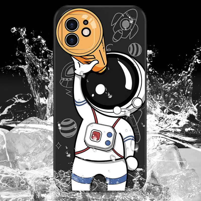 Silicone phone case with cartoon astronaut and planet design for iPhone.