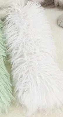 Soft plush cat toy pillow in blue, green, pink, or white, measuring 27 by 10 centimetres.