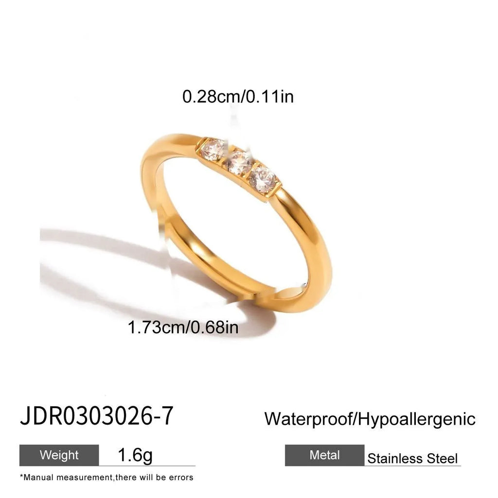Silver tone geometric zircon ring with European-American styling on stainless steel background