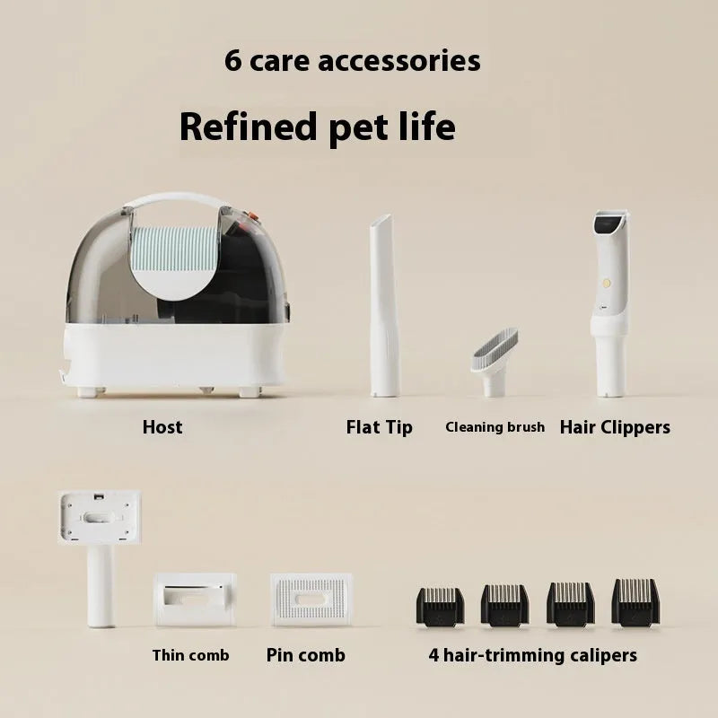 White and pink multifunctional pet grooming vacuum cleaner with clipper attachments on a table.