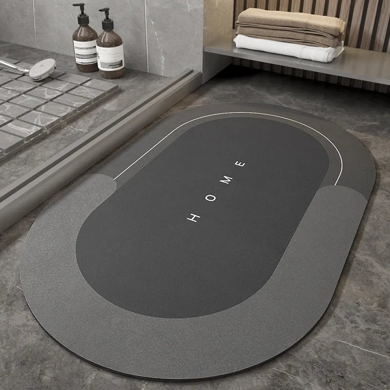 Blended fabric bathroom floor mat in oval and rectangular shapes on a tiled floor.