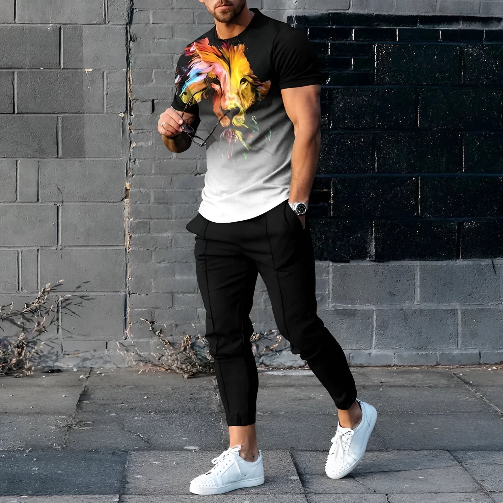 Men's short-sleeved printed pullover and matching trousers set on a neutral background