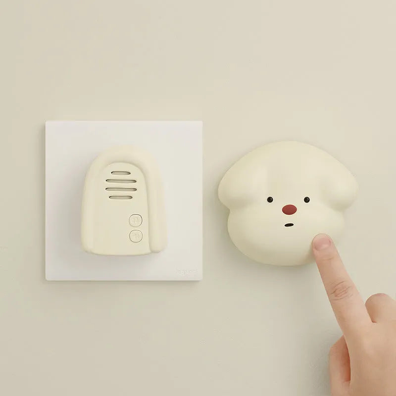 Household wireless plug-in beeper doorbell in milky yellow or white colour