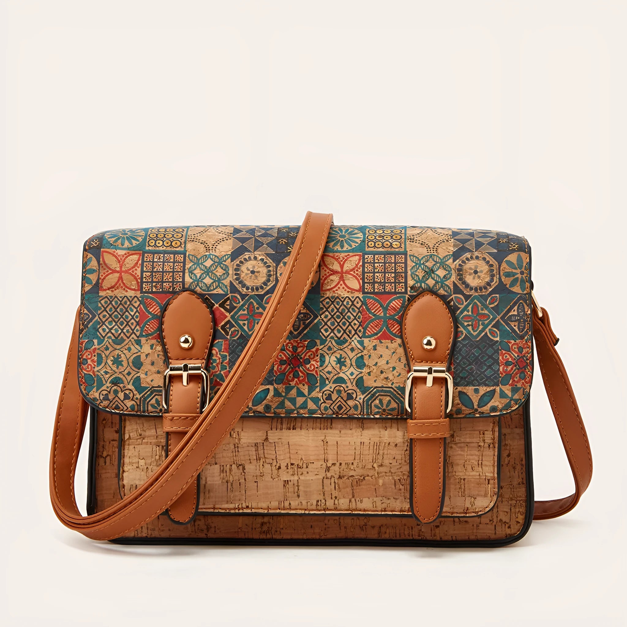 Women's large crossbody bag in a printed PU material with a single shoulder strap.