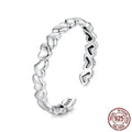 925 sterling silver open heart ring on white background with adjustable band and polished finish