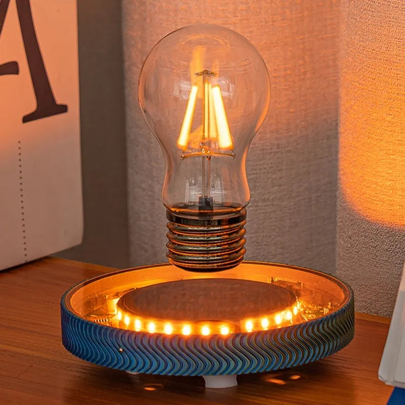 Small white magnetic suspension moon lamp floating above its base as a night light.