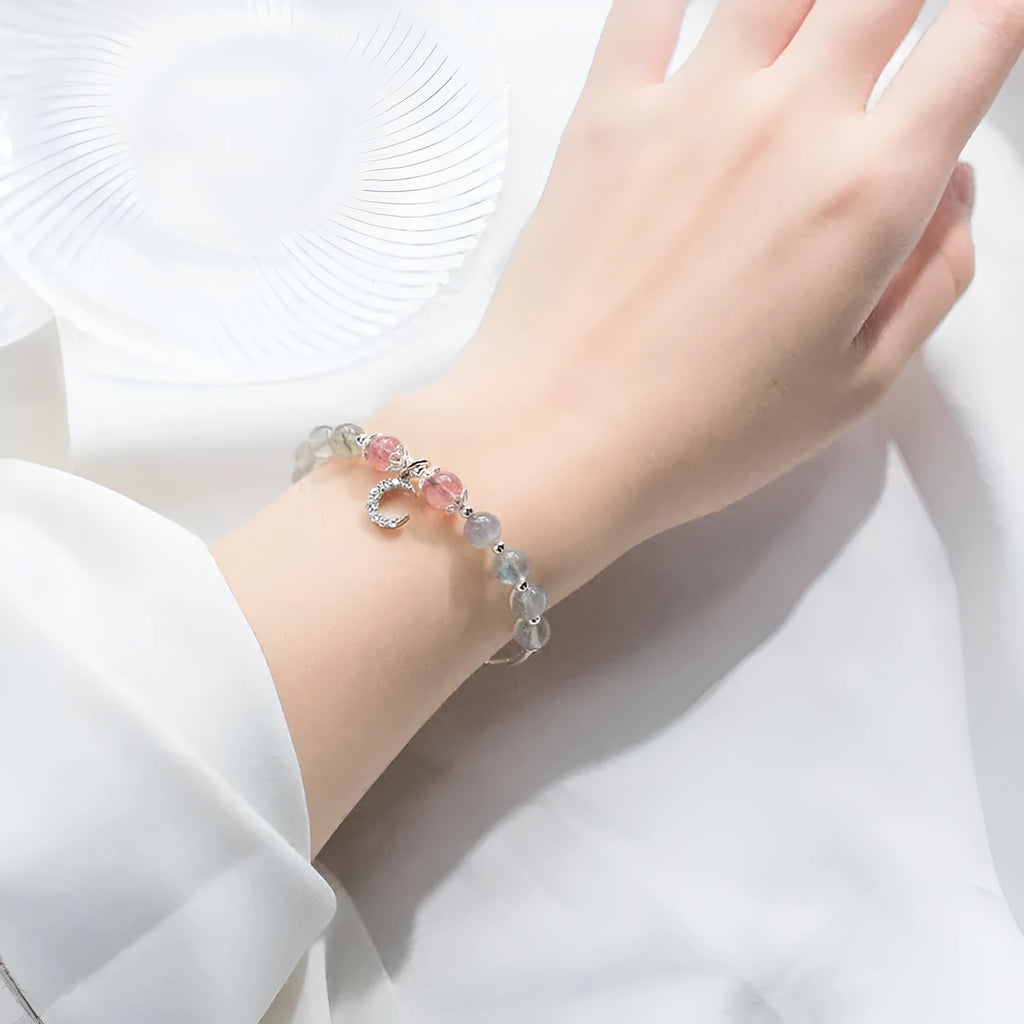 Natural moonstone bracelet with crescent moon charm and adjustable silver chain for women