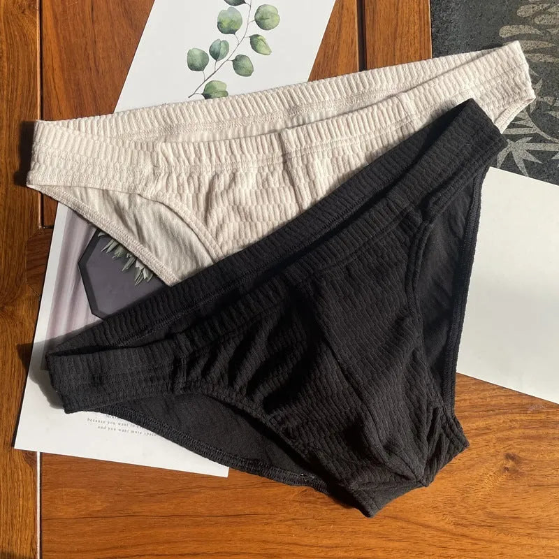Men's cotton briefs in solid colours showing mid waist and triangle design
