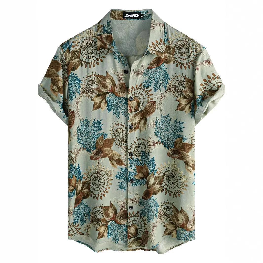 Man wearing a short sleeve lapel collar Hawaiian shirt with a blue floral print.