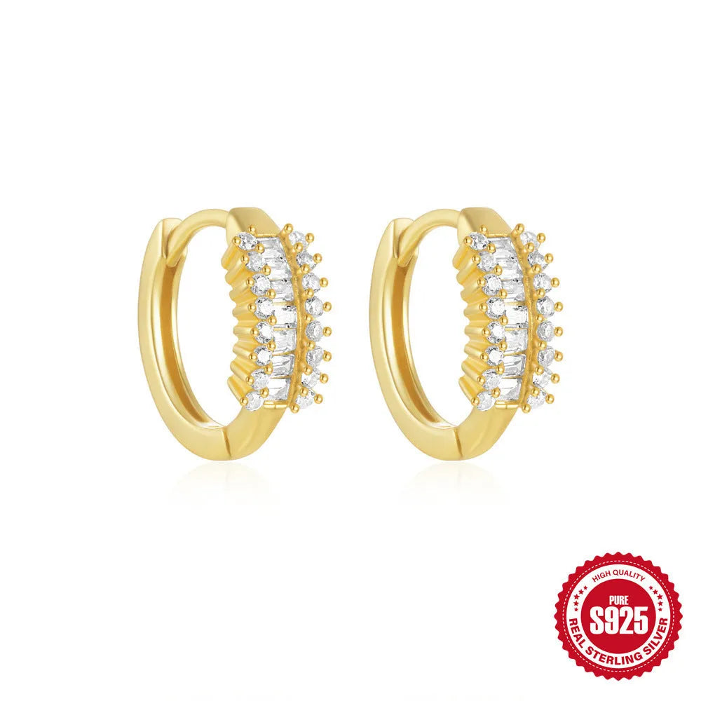 Sterling silver geometric stud earrings with small round diamond accents in gold or silver electroplated finish