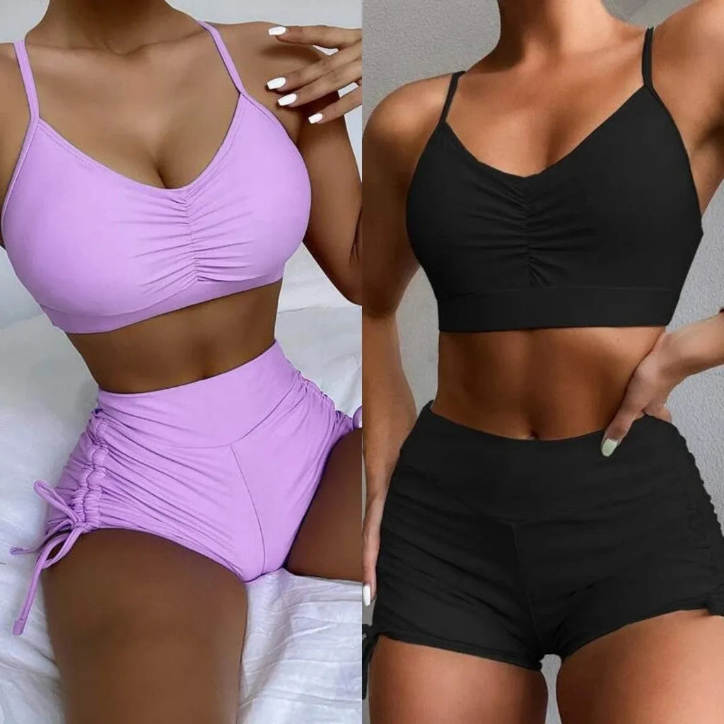 Women's high-waist split bikini swimsuit in black or purple colour with sleeveless design