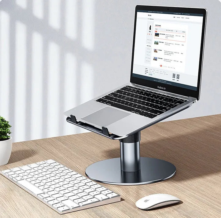 Silver adjustable aluminium alloy car laptop stand with rotating base and non-slip support plate.