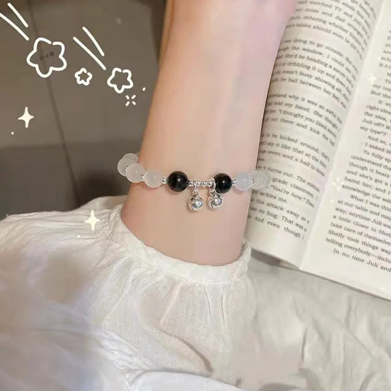 Handmade Chinese style glass bracelet with bamboo joint beads in a red Lvzhu Duobao design.