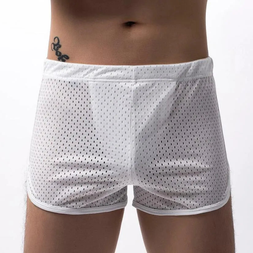 Men's black three-point boxer shorts made from a cotton and nylon blend fabric.