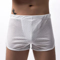 Men's black three-point boxer shorts made from a cotton and nylon blend fabric.
