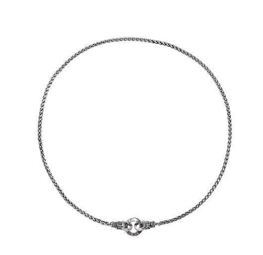 Close-up of a women's sterling silver clavicle necklace with a classic chain, shown against a neutral background.