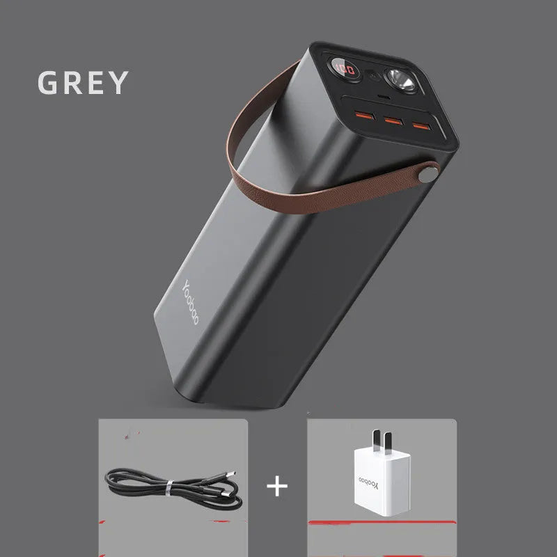 Black portable power bank with solar panel and multiple charging ports for outdoor emergency use
