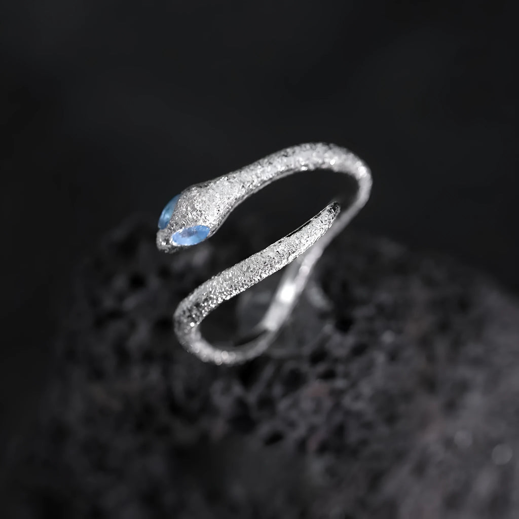 Adjustable silver ring with snake zodiac design electroplated in platinum colour