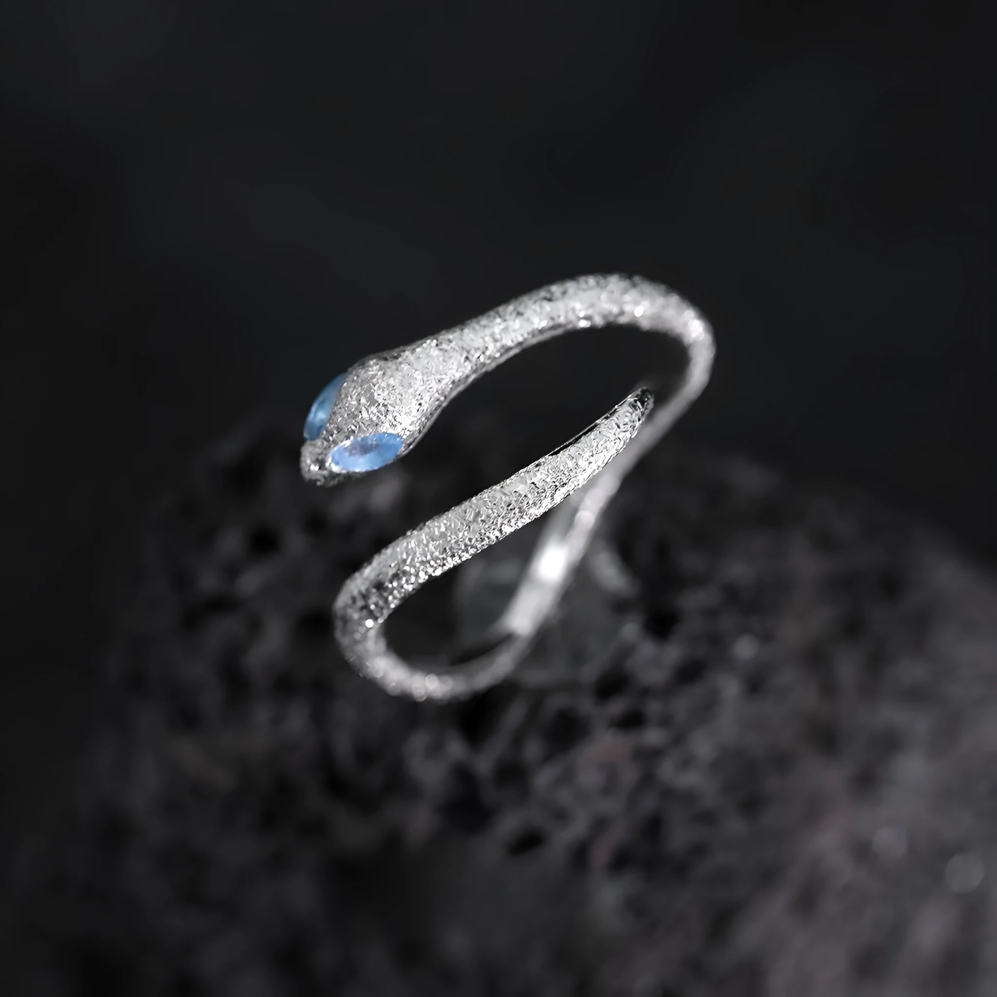 Adjustable silver ring with snake zodiac design electroplated in platinum colour