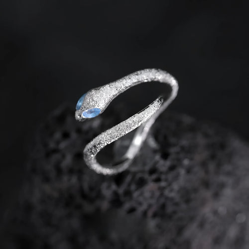 Adjustable silver ring with snake zodiac design electroplated in platinum colour