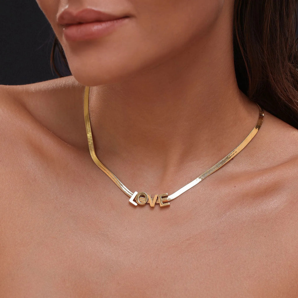 Titanium steel number and letter necklace with gold electroplated finish on grinding chain design
