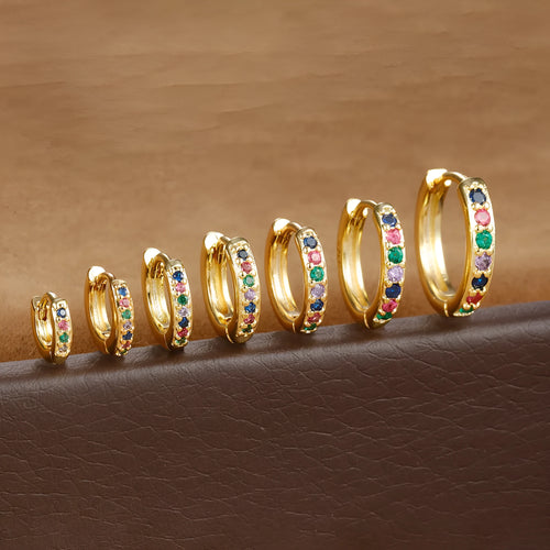 Circle zircon perforated stud earrings in gold, rose gold, and silver colours showing geometric round design with multiple size options