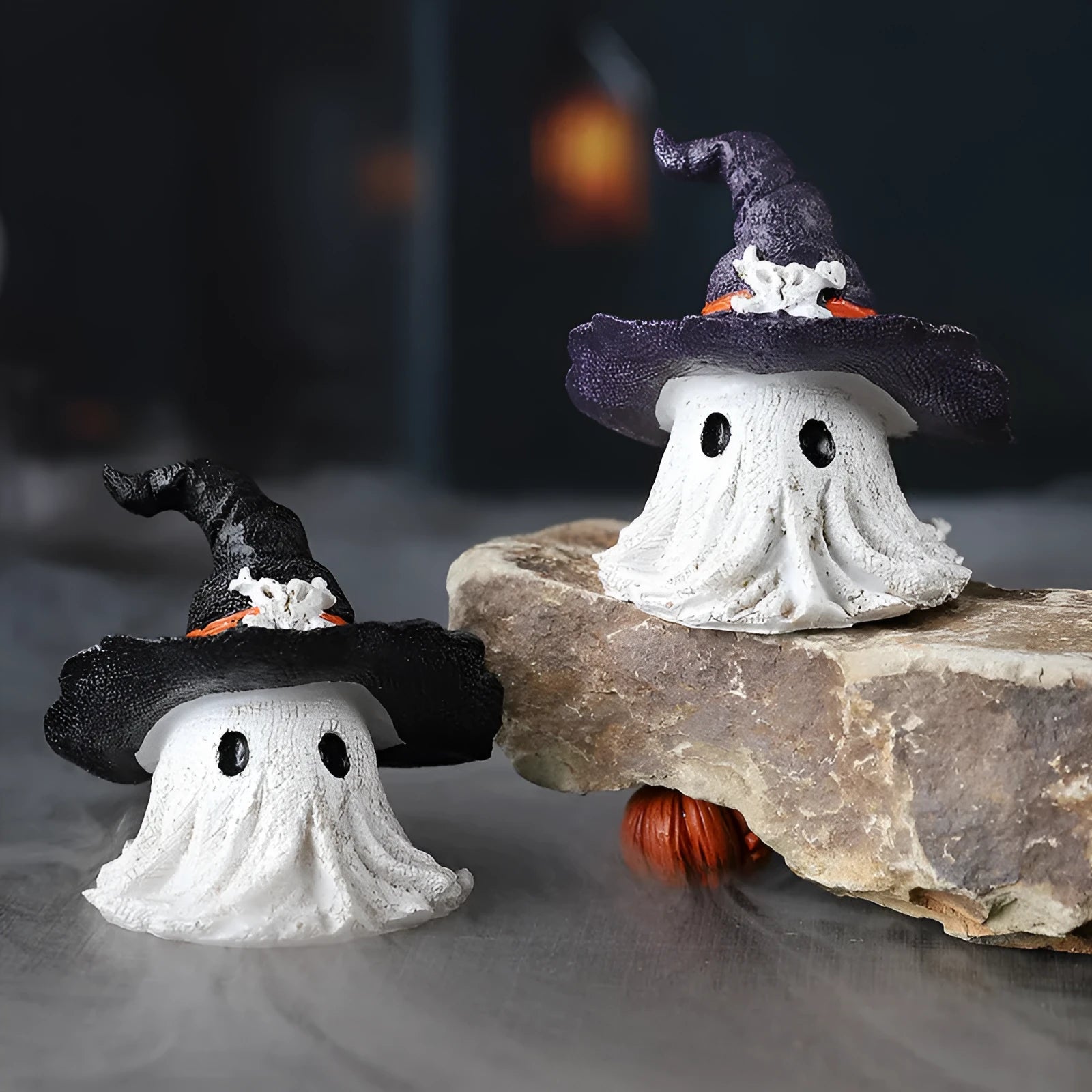 Purple and black resin wizard hat ghost ornaments for Halloween and Christmas seasonal displays