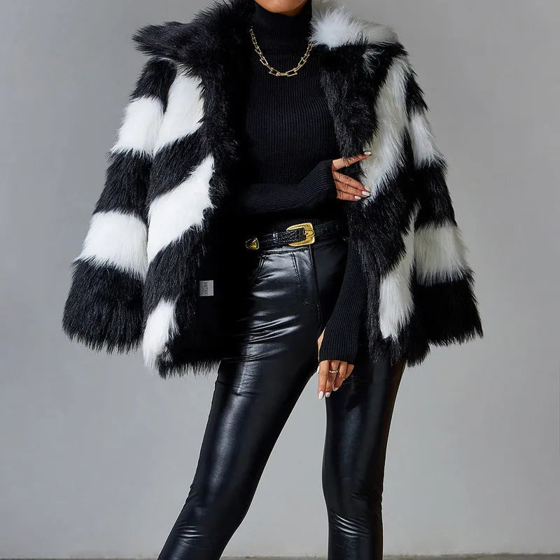 Women's lapel contrast colour coat with faux fur collar in picture colour, shown on model.