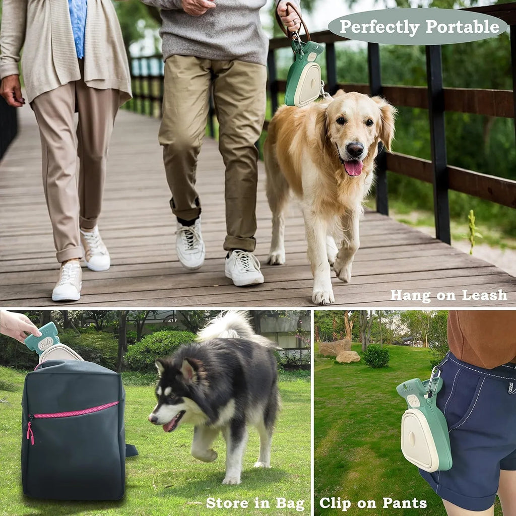 Blue handheld dog pooper scooper with clip and bag dispenser on a green background.