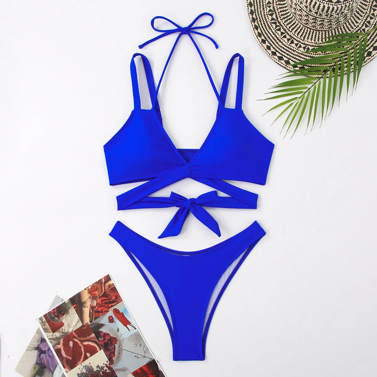 Women's solid colour strap bikini swimsuit in briefs style showing black, blue, red, rose red, and white colour options