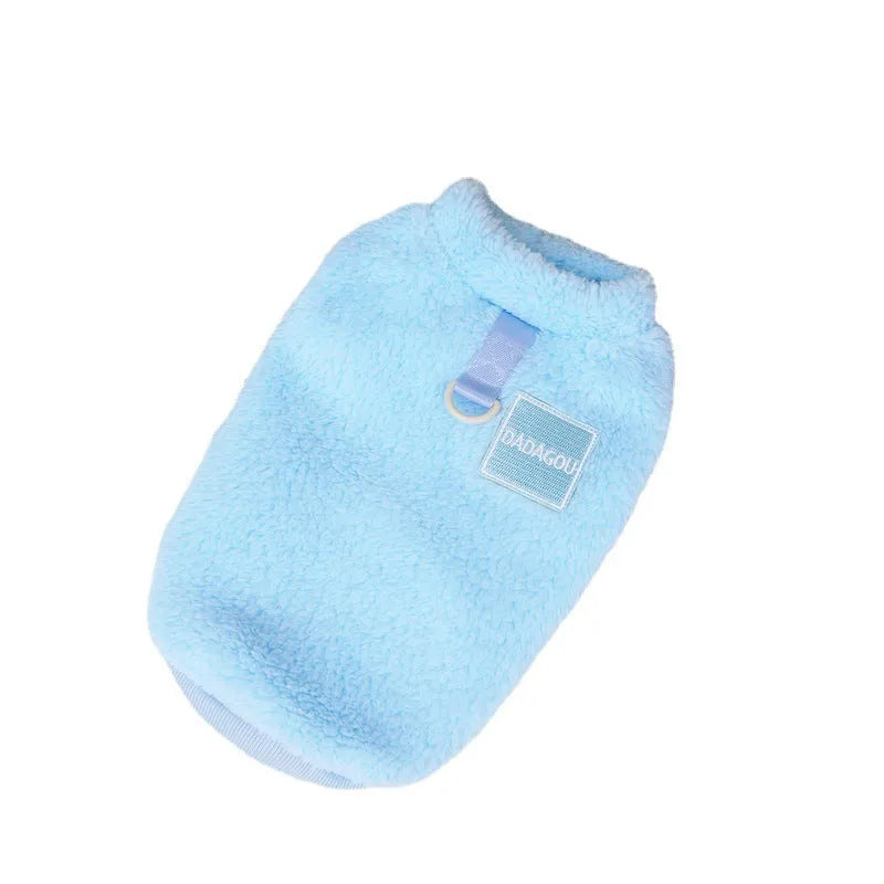 A dog wearing a soft blue coral fleece casual jacket.