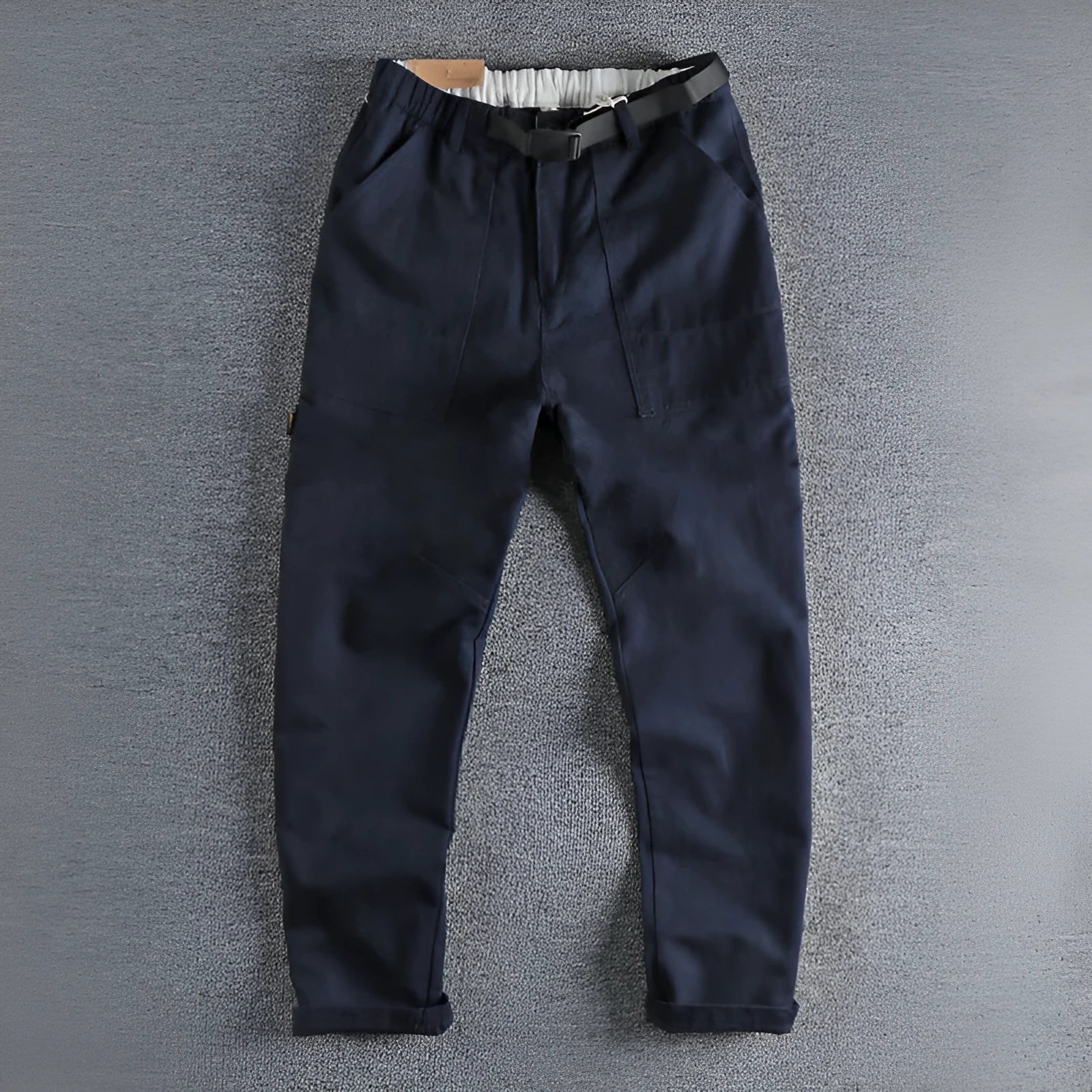 Cotton work trousers in khaki colour with mid waist design and zip fly closure