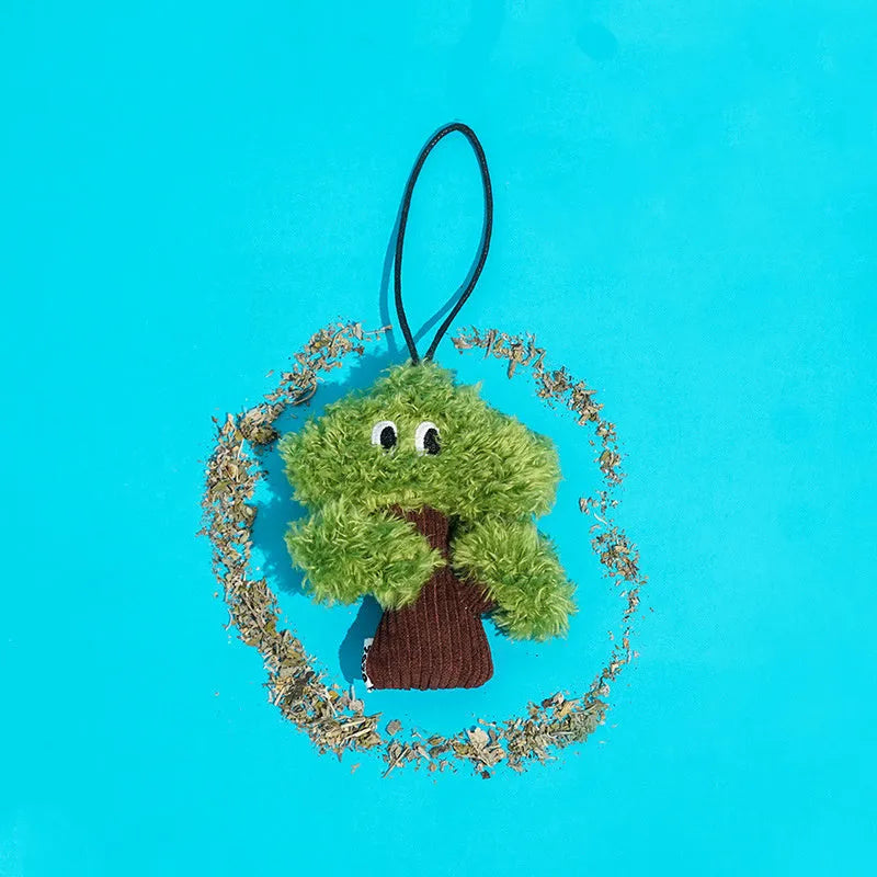 Pine tree shaped cat mint toy with dangling tease stick for chewing and interactive play