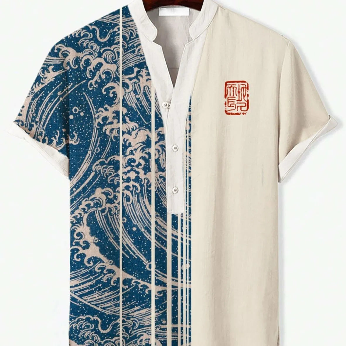 Man wearing a short sleeve shirt with a colourful 3D digital animal print design on the front.