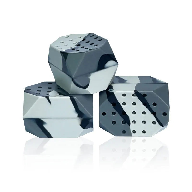 Two camouflage pattern silicone facial exercise balls for jaw training in transparent box
