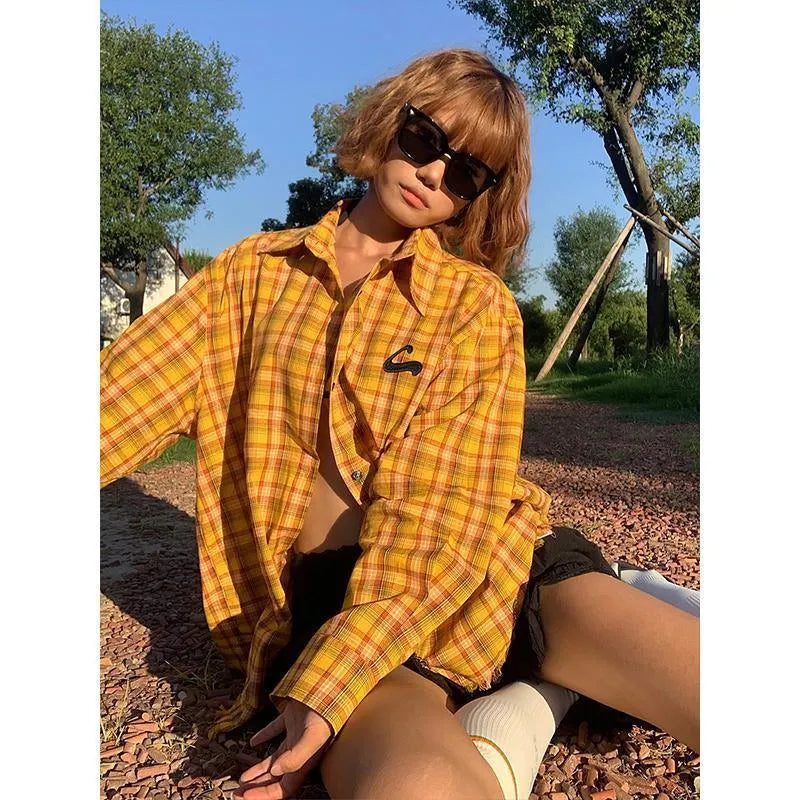 Dopamine yellow and black plaid pattern on a loose-fit men's and women's cardigan-style shirt.