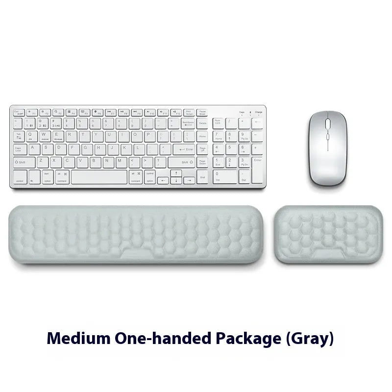 Memory foam mouse wrist rest pad with silicone base in black cloth cover option on desk