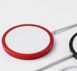 Silver metal Magsafe magnetic wireless charger for iPhone showing magnetic ring.