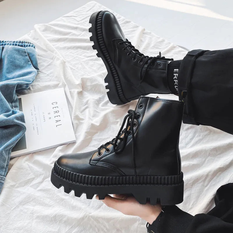 Men's black platform ankle boots with 8-eye lacing and a side zipper on a rubber sole.