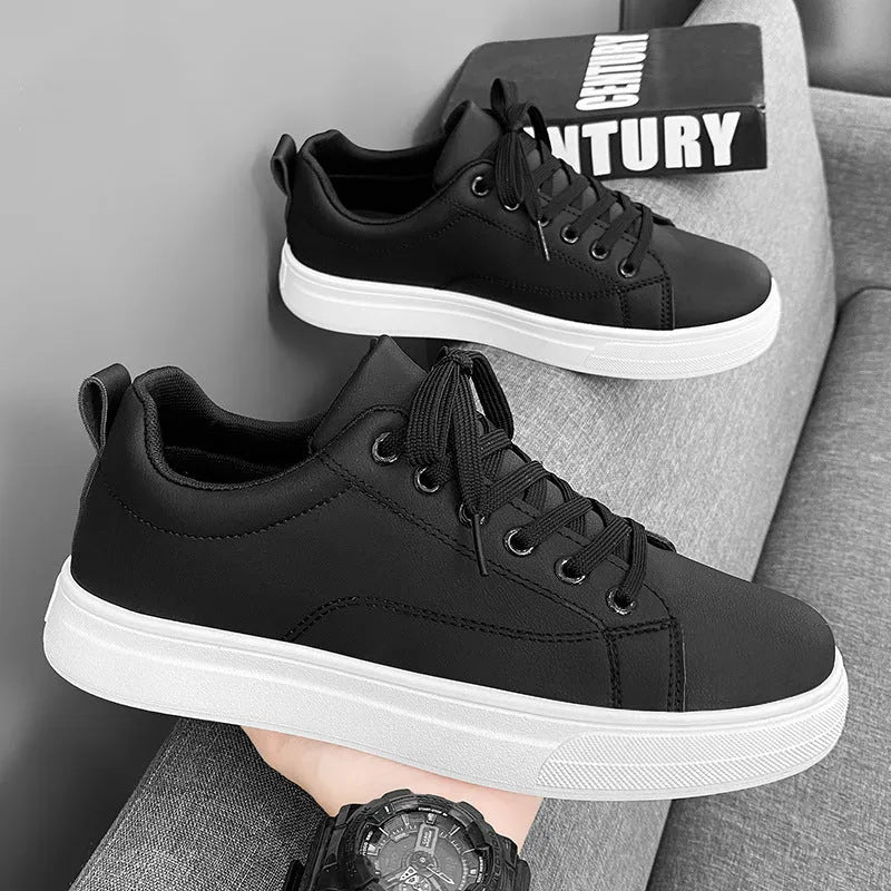 Men's Korean-style low-top sneakers in white, black, or two-tone colour with flat rubber sole