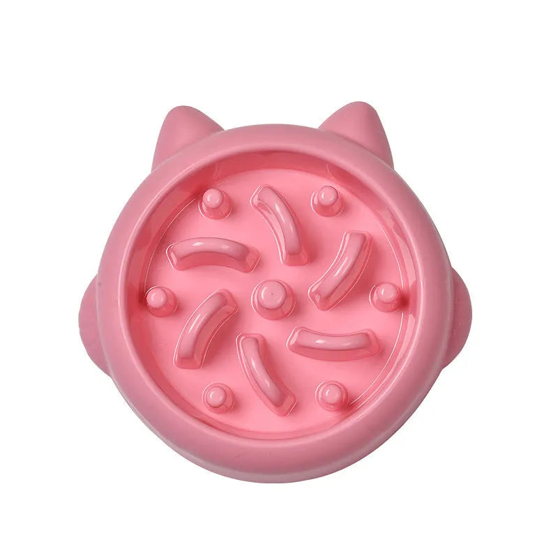 Green pet slow feeder bowl with raised internal maze design for dogs and cats