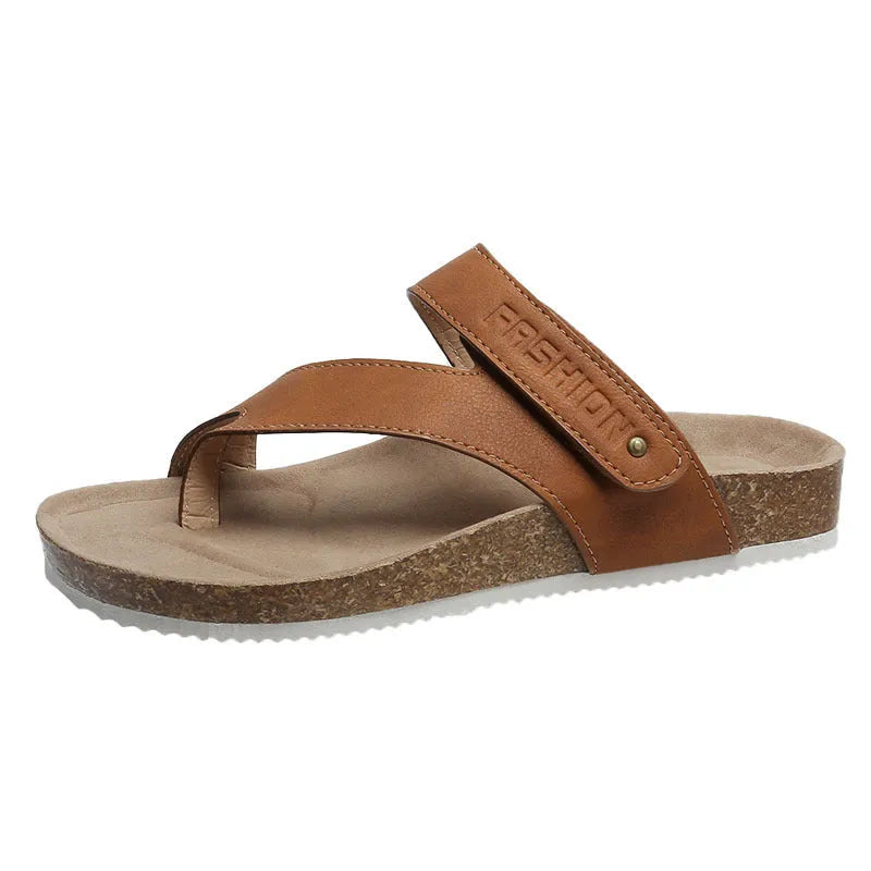 Women's flat toe ring flip-flop in a solid colour with a thick foam sole.