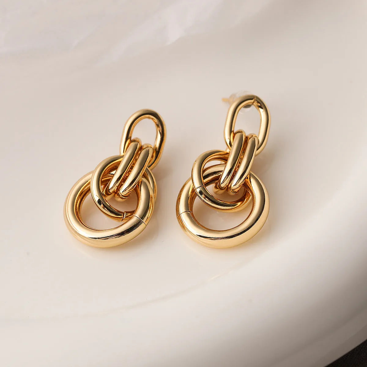 Geometric gold irregular earrings with asymmetrical copper alloy design for women