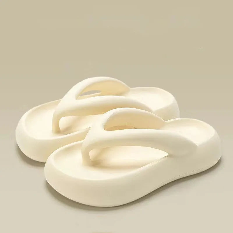 Women's thick-soled EVA flip-flops with a bow detail in assorted colours on a white background.