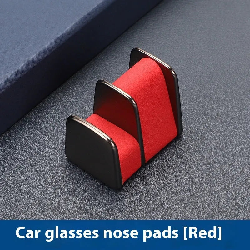 Zinc alloy car glasses clip with leather pad in choice of colours for dashboard or visor.