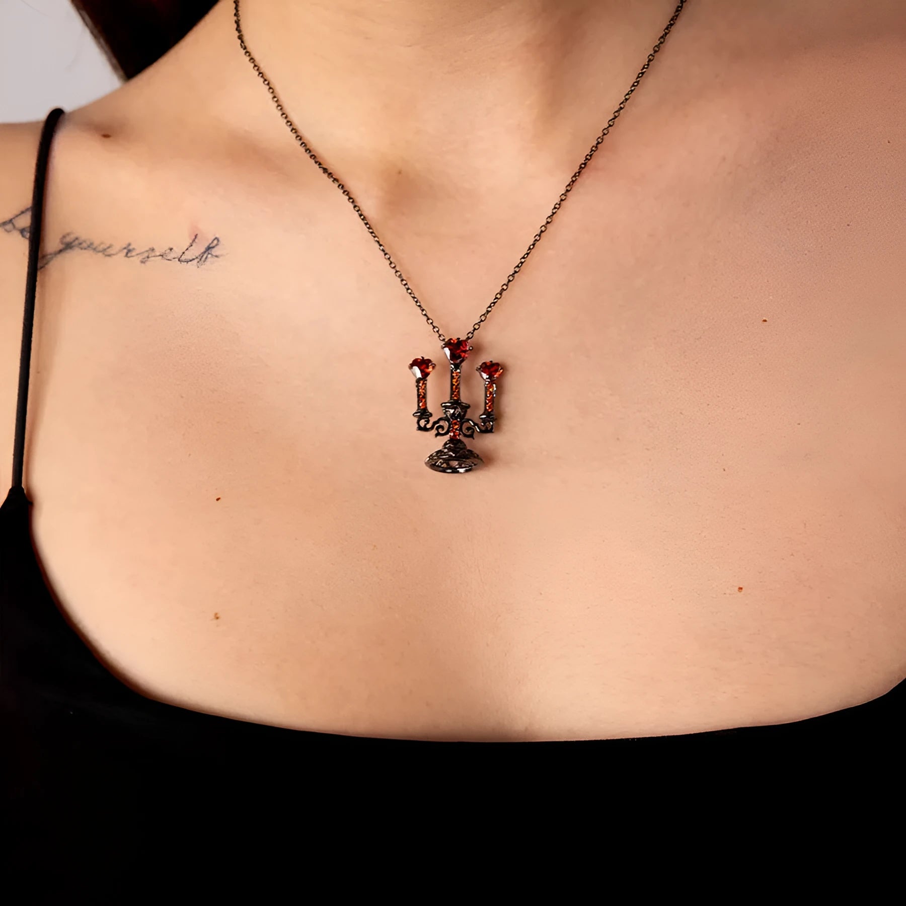 Gothic-style zinc alloy clavicle necklace featuring a hollow candlestick pendant and cross chain in a retro finish.